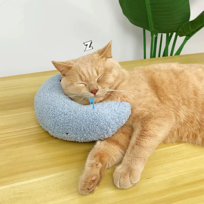 Almohada de peluche para mascotas en reposo