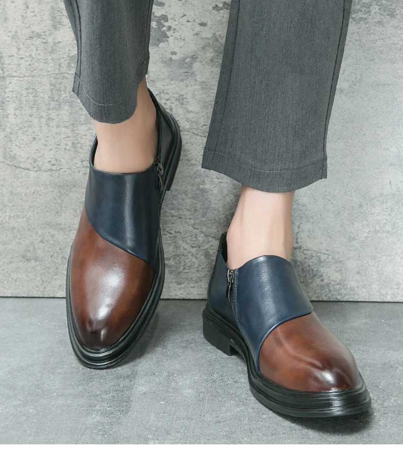 Vista lateral de los zapatos elegantes de hombre con cremallera lateral