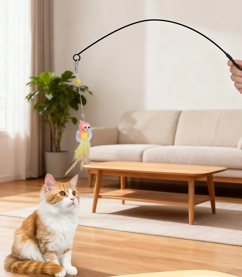 Gato jugando con la varita