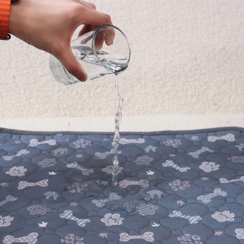Alfombrilla absorbente impermeable para orina de perros y gatos