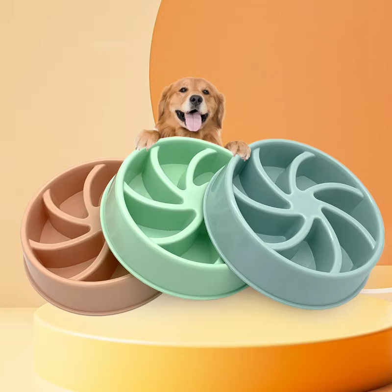 Comedero lento para mascotas en color rosa