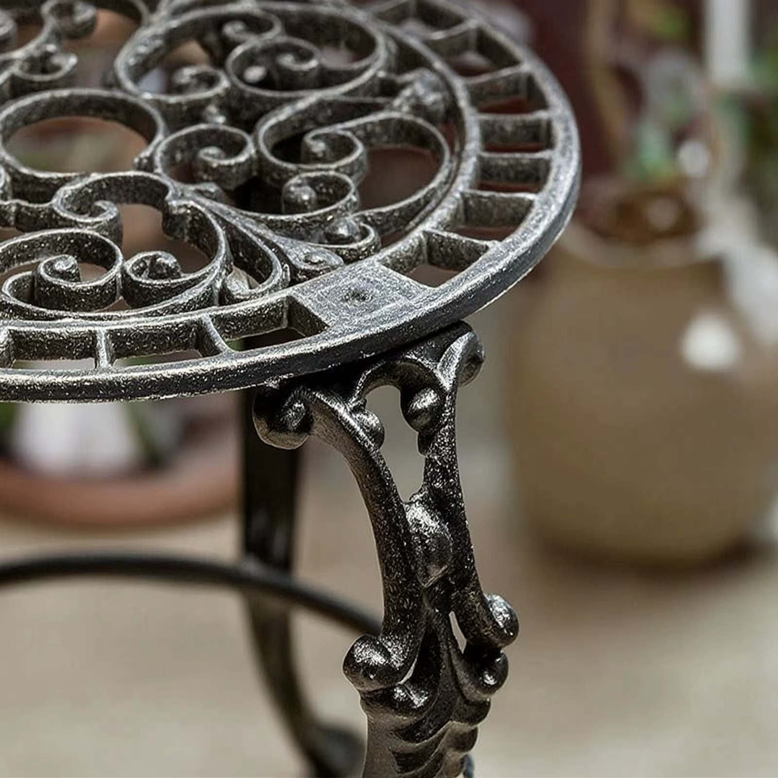 Soporte redondo para macetas de hierro fundido – Pie antiderrame decorativo - imagen 4