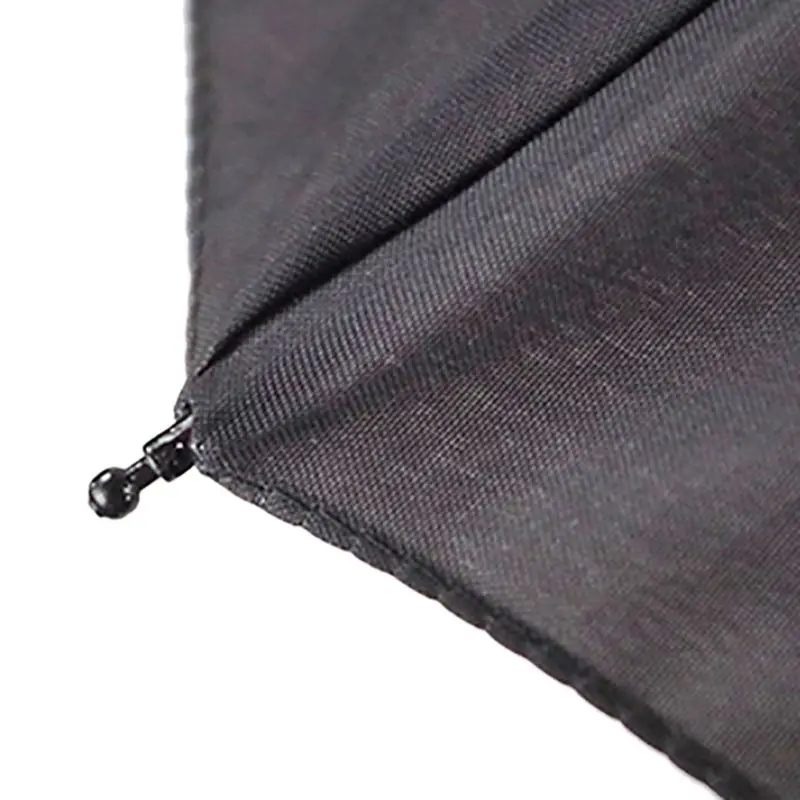 Paraguas con funda y detalle