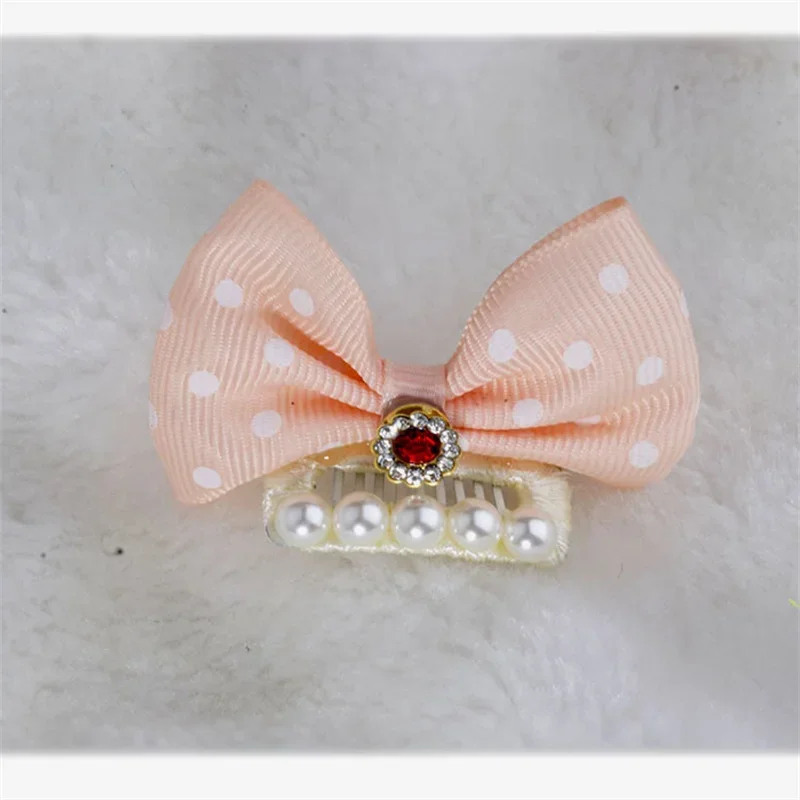 Diseño con diamantes de imitación y perlas