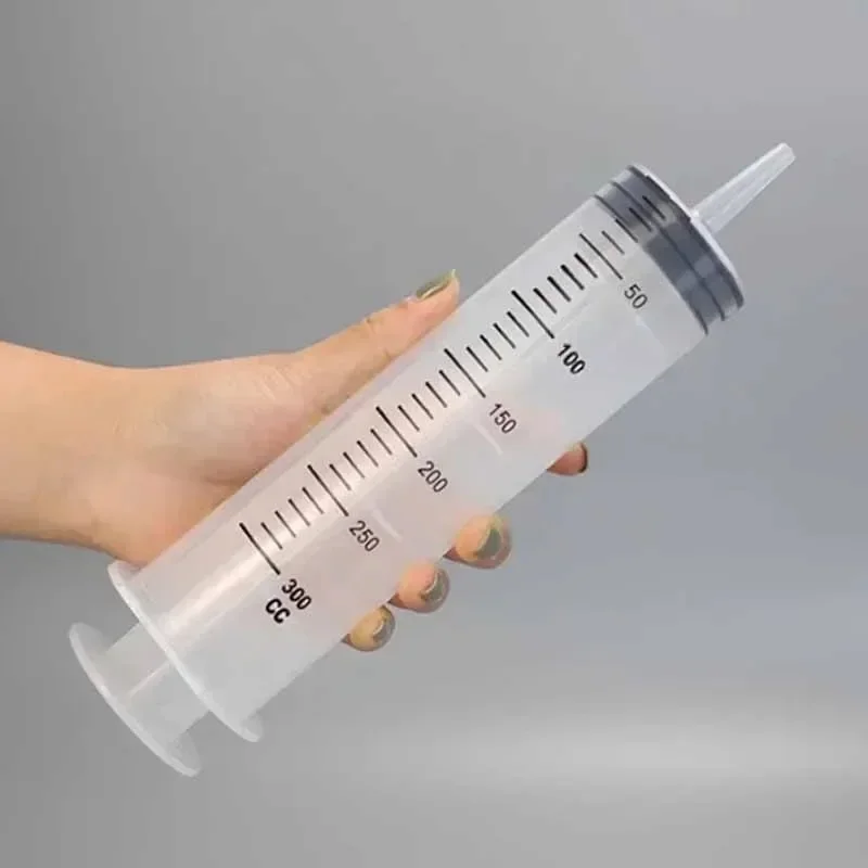 Jeringa dosificadora con tubo para gatos y perros