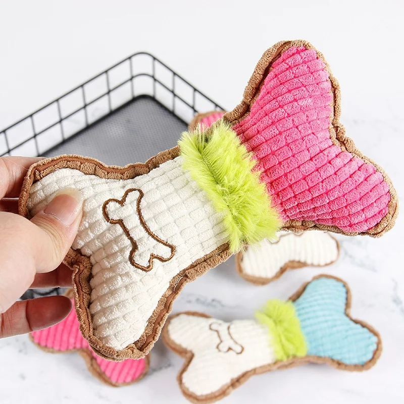 Juguete de hueso con sonajero para perro