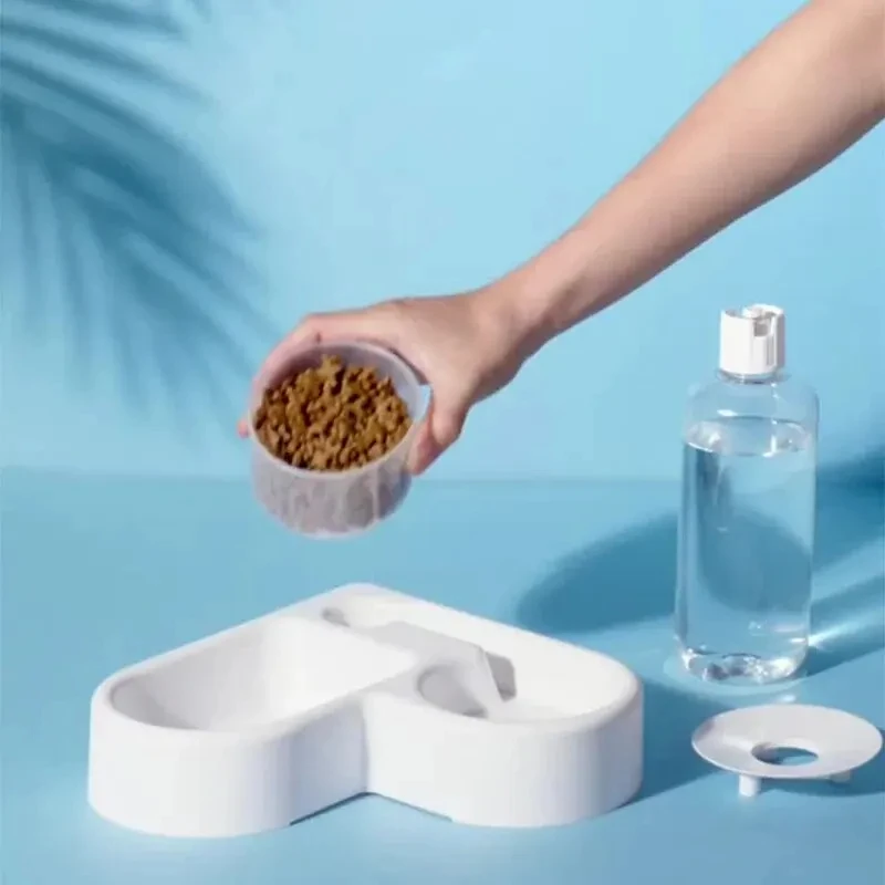 Cuenco lateral con agua y pienso separados