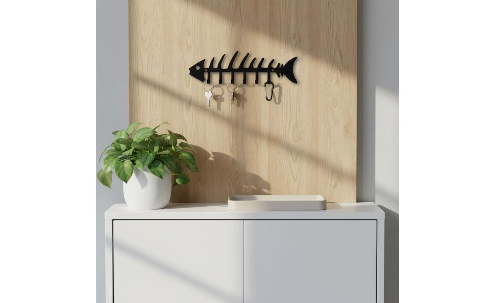 Gancho de pared con diseño de esqueleto de criatura marina