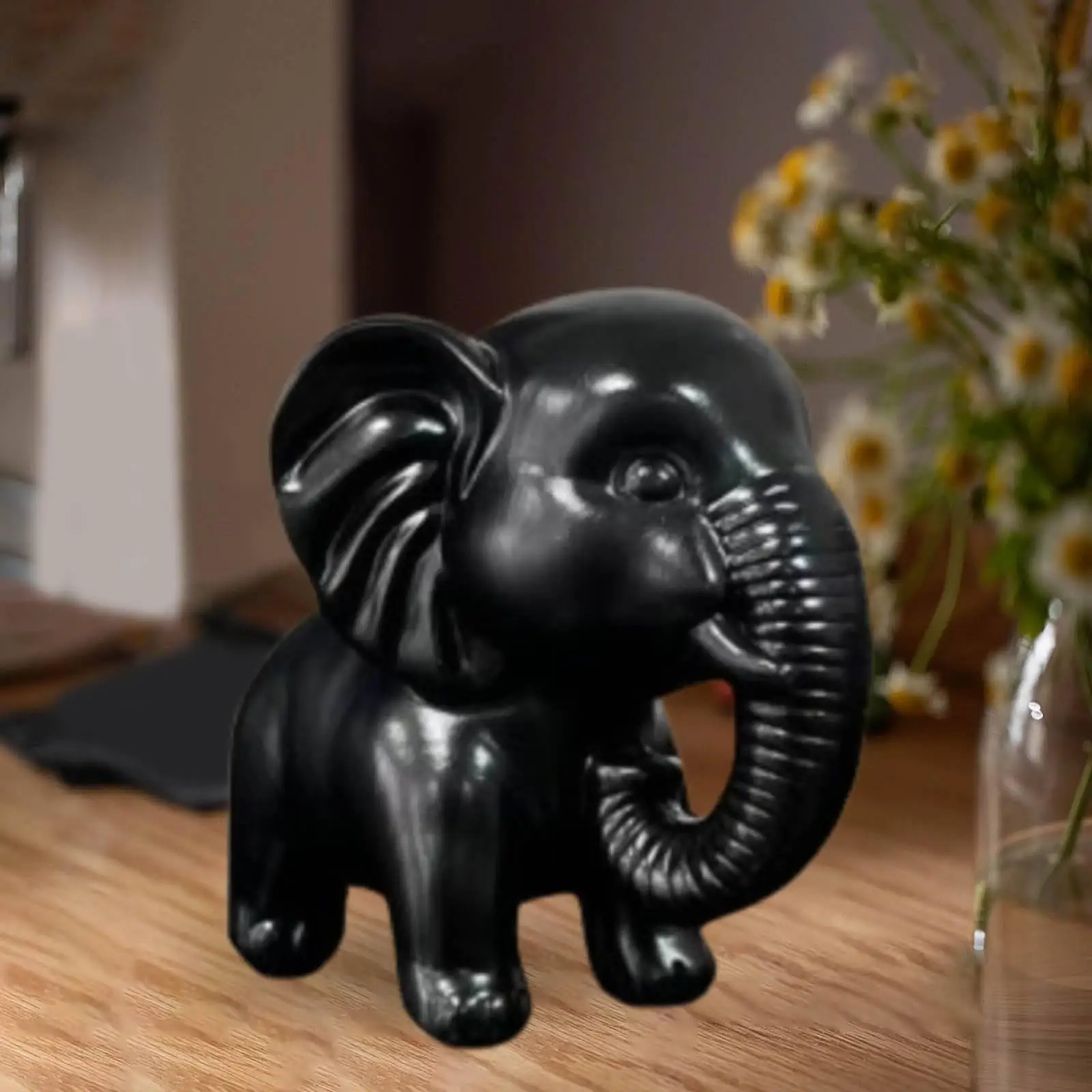 Escultura de elefante en contexto de decoración de hogar