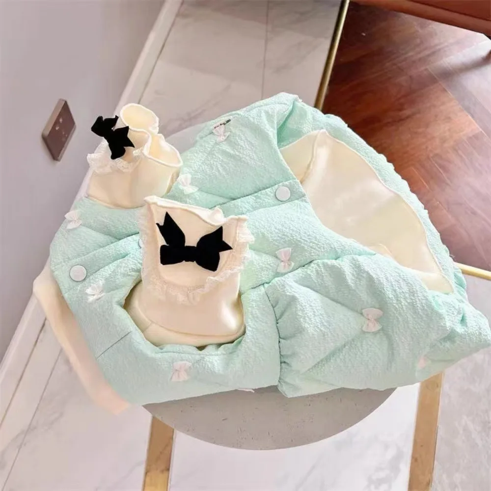 Abrigo de terciopelo para mascota detalle lazo