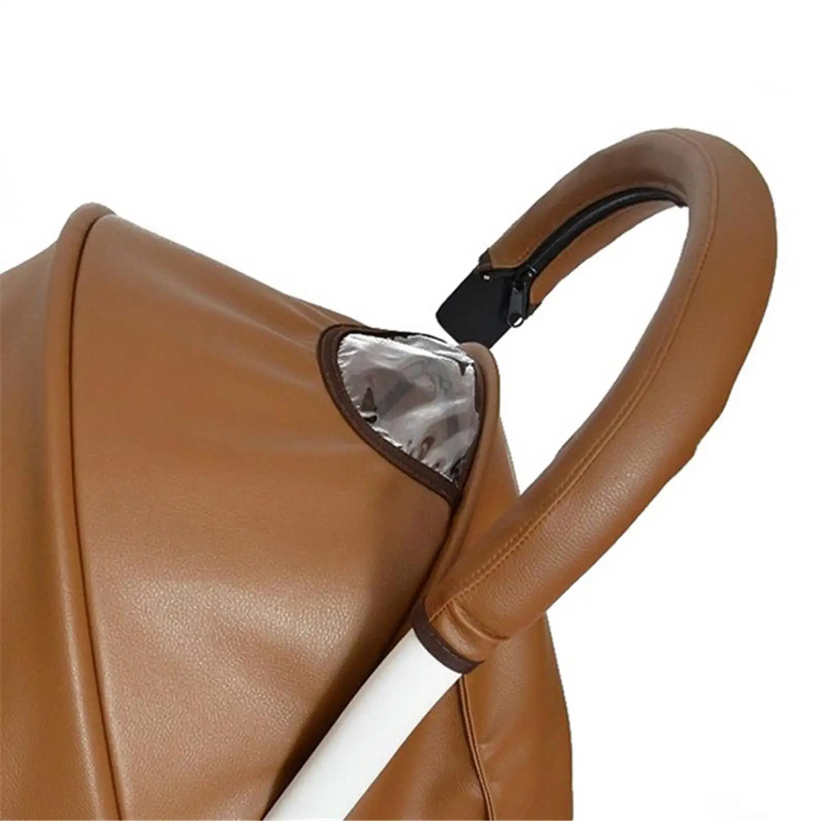 Funda protectora para el manillar de un cochecito
