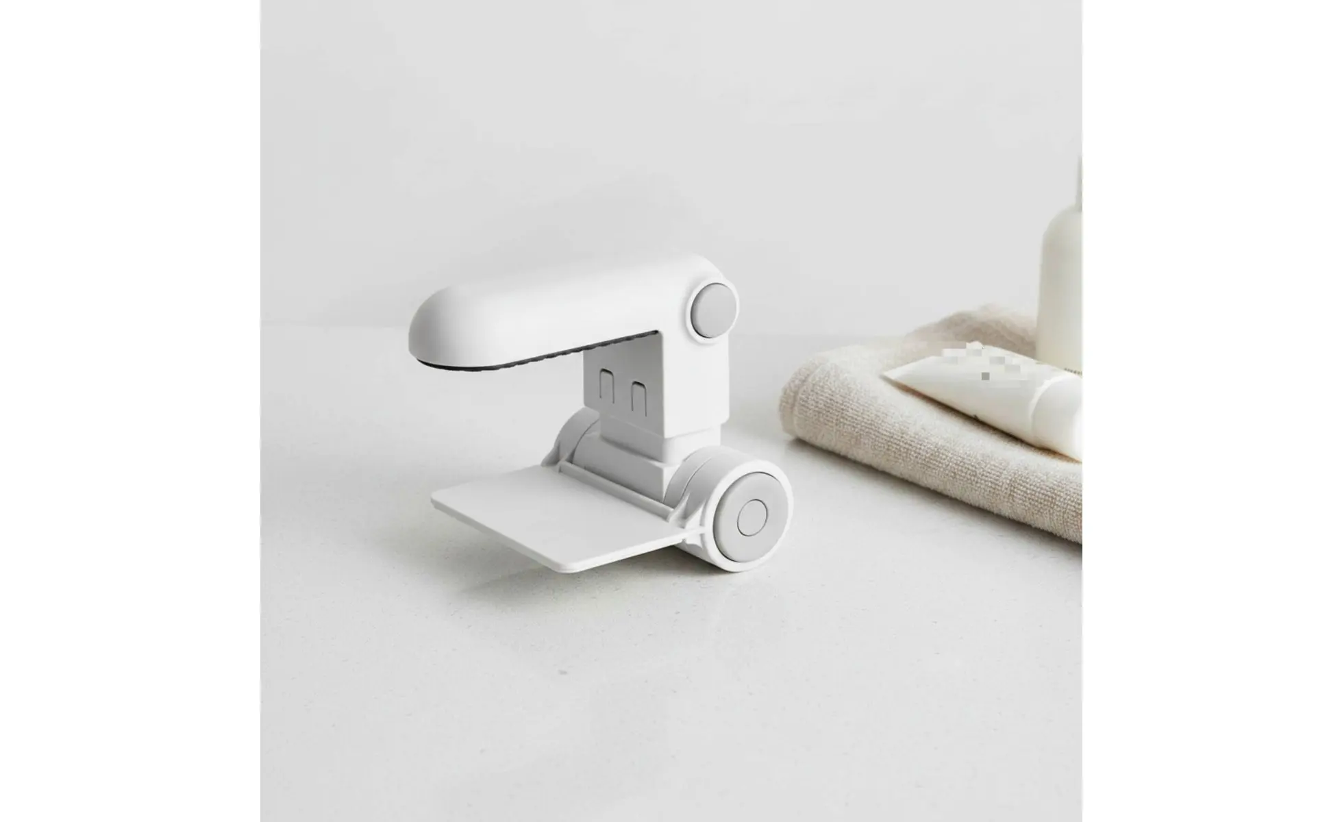 Detalle del mecanismo de cierre para uso con una sola mano