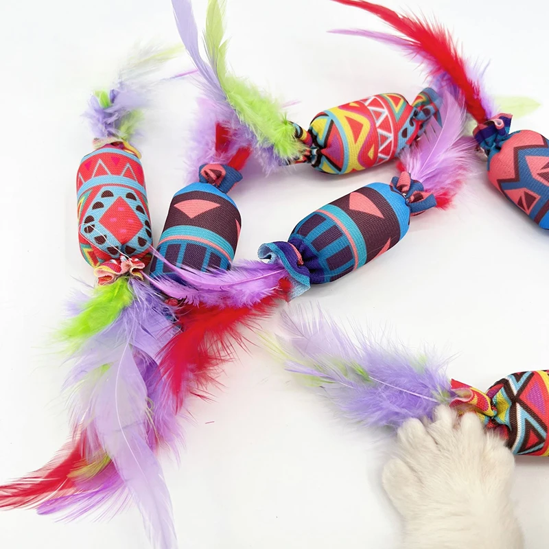 Juguetes de plumas con sonido y campanas para gatos