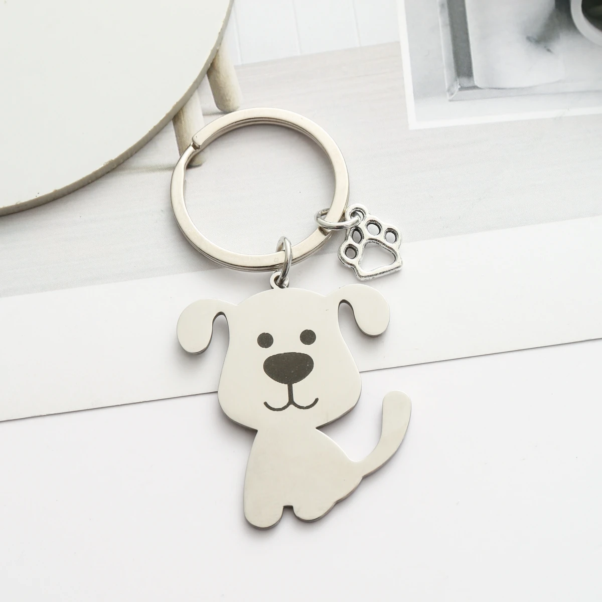Llavero de acero inoxidable con pata de perro plateado, regalo