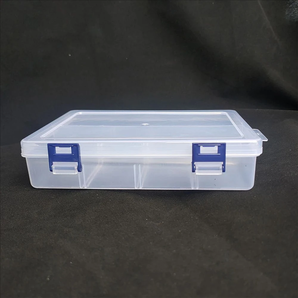 Interior de la caja con los 8 compartimentos visibles