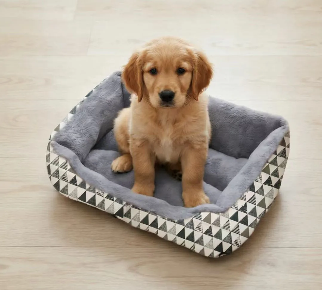 Cama tipo nido con bordes elevados en color gris