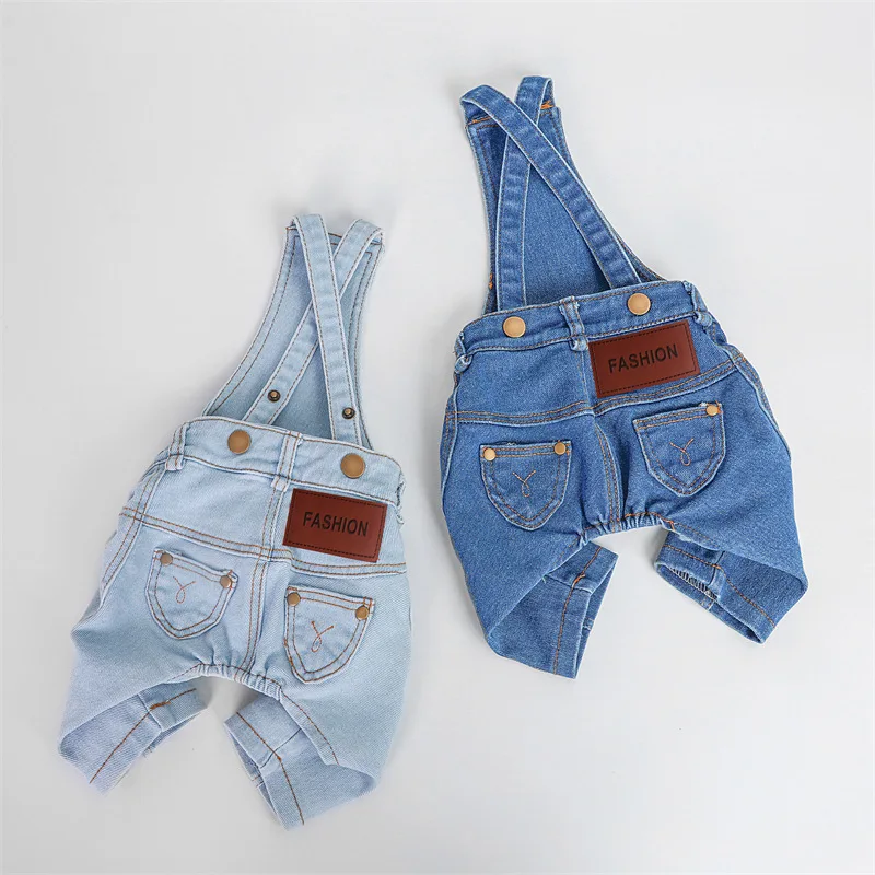 Perro wearing denim jumpsuit