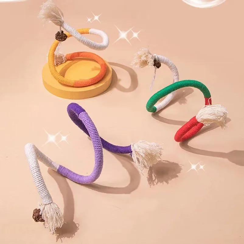 Juguete de plumas con varilla
