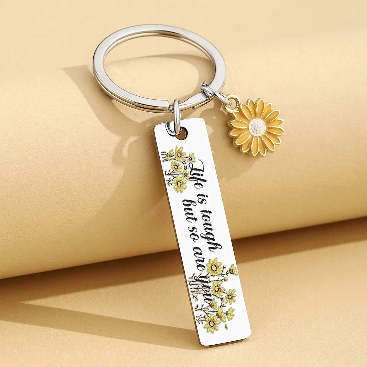 Llavero girasol en uso diario con llaves