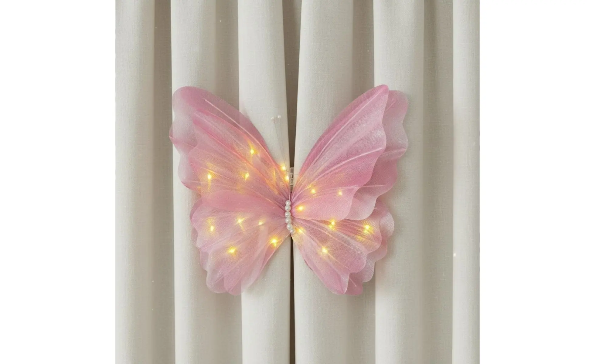 Detalle de las luces de hadas de mariposa brillantes