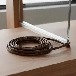 Tira amortiguadora ajustable PVC para muebles con cristal