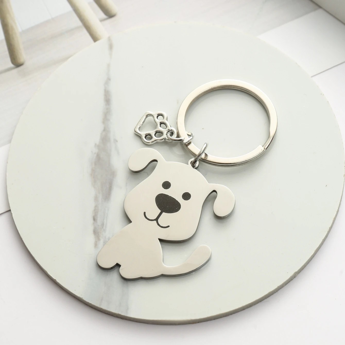 Llavero de acero inoxidable con pata de perro plateado, regalo - imagen 2