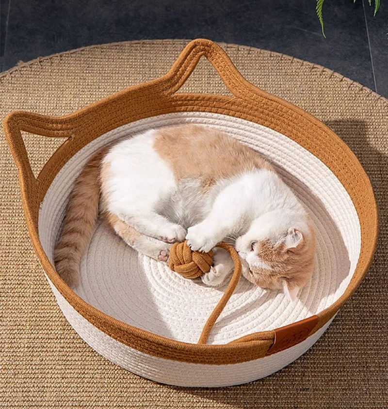 Cesta de mimbre redonda para descanso del gatito