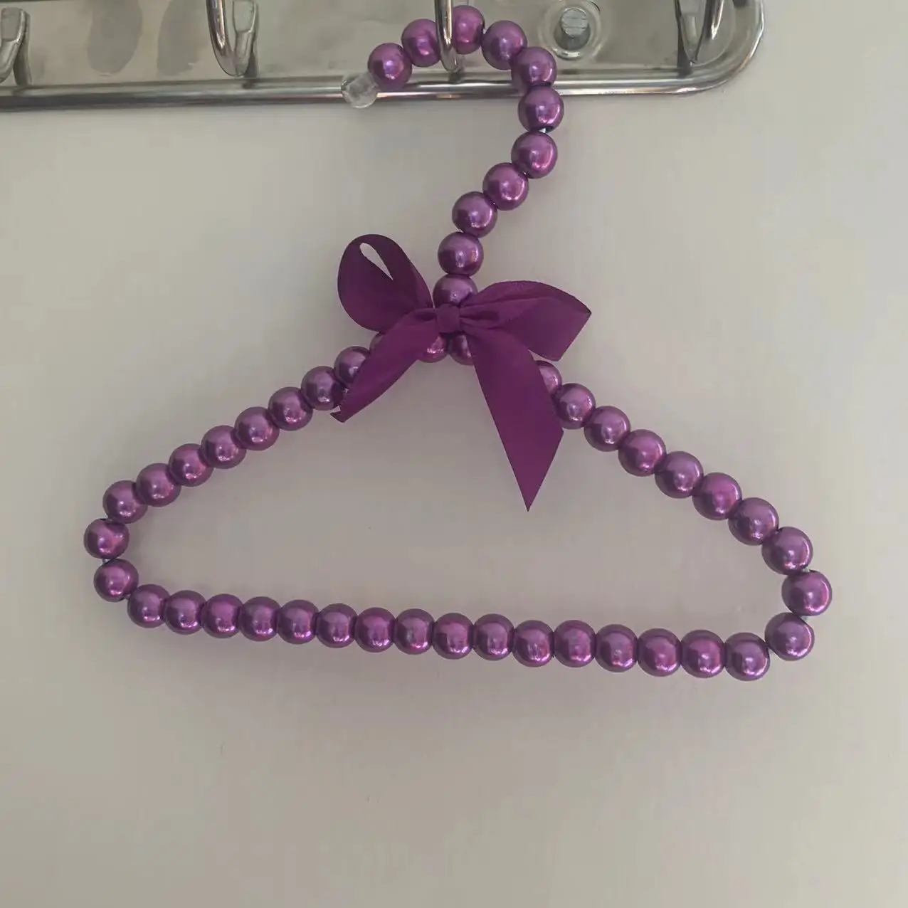 Colgador de perlas con forma de corazón
