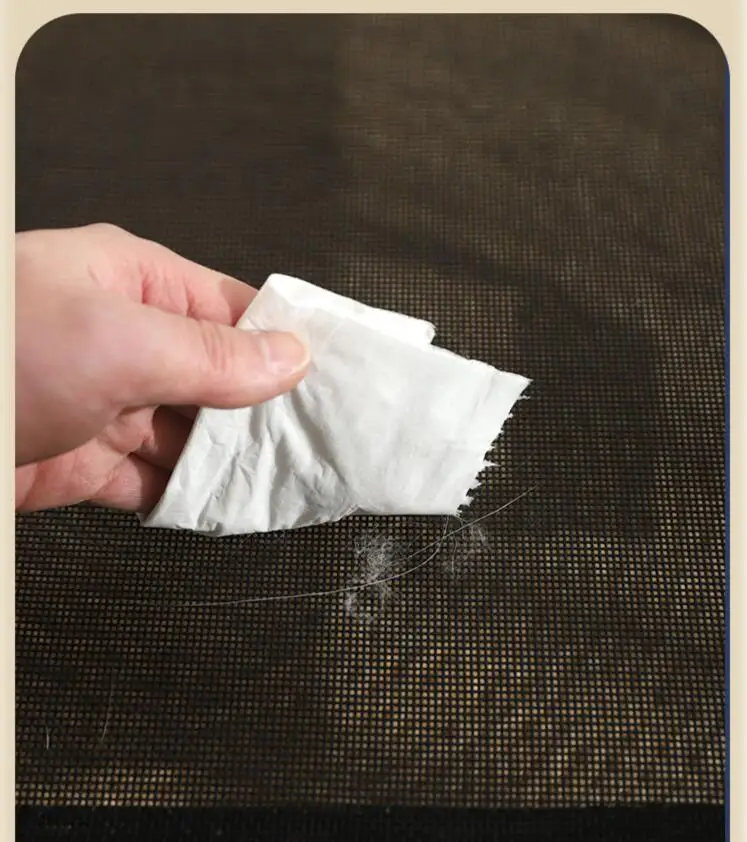 Detalle de la tela transpirable y resistente al agua de la cama