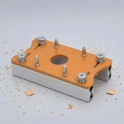 Plantilla ranuradora compacta ajustable para router