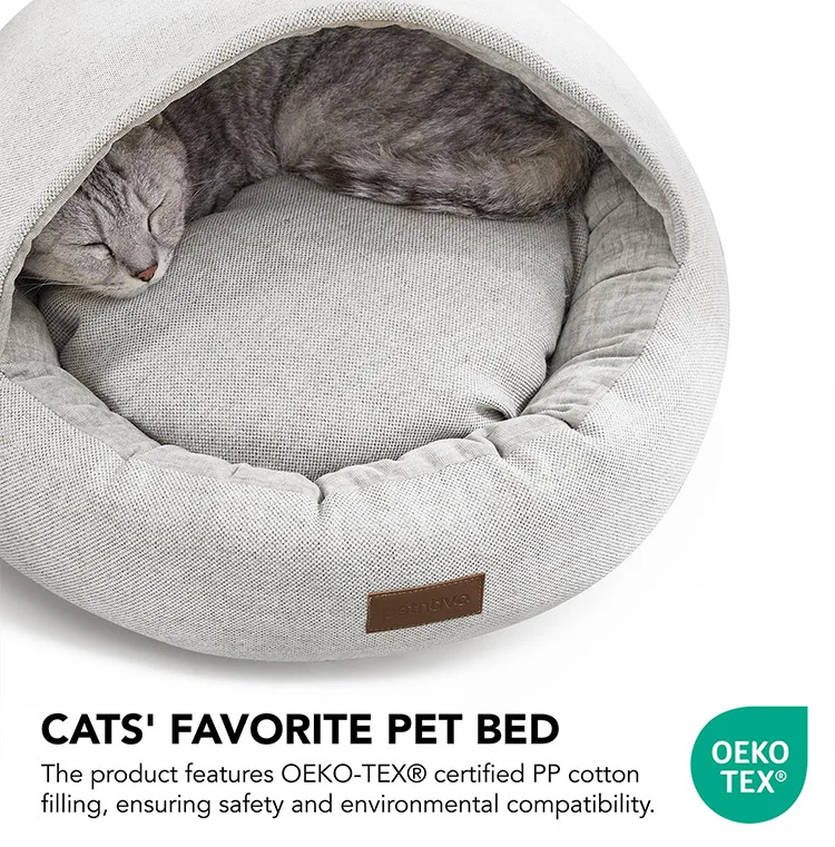 Cama para mascotas ovalada con gato descansando