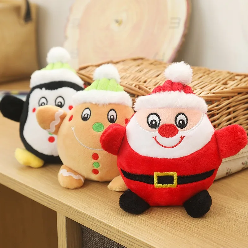 Juguete de peluche de pingüino de Papá Noel frente