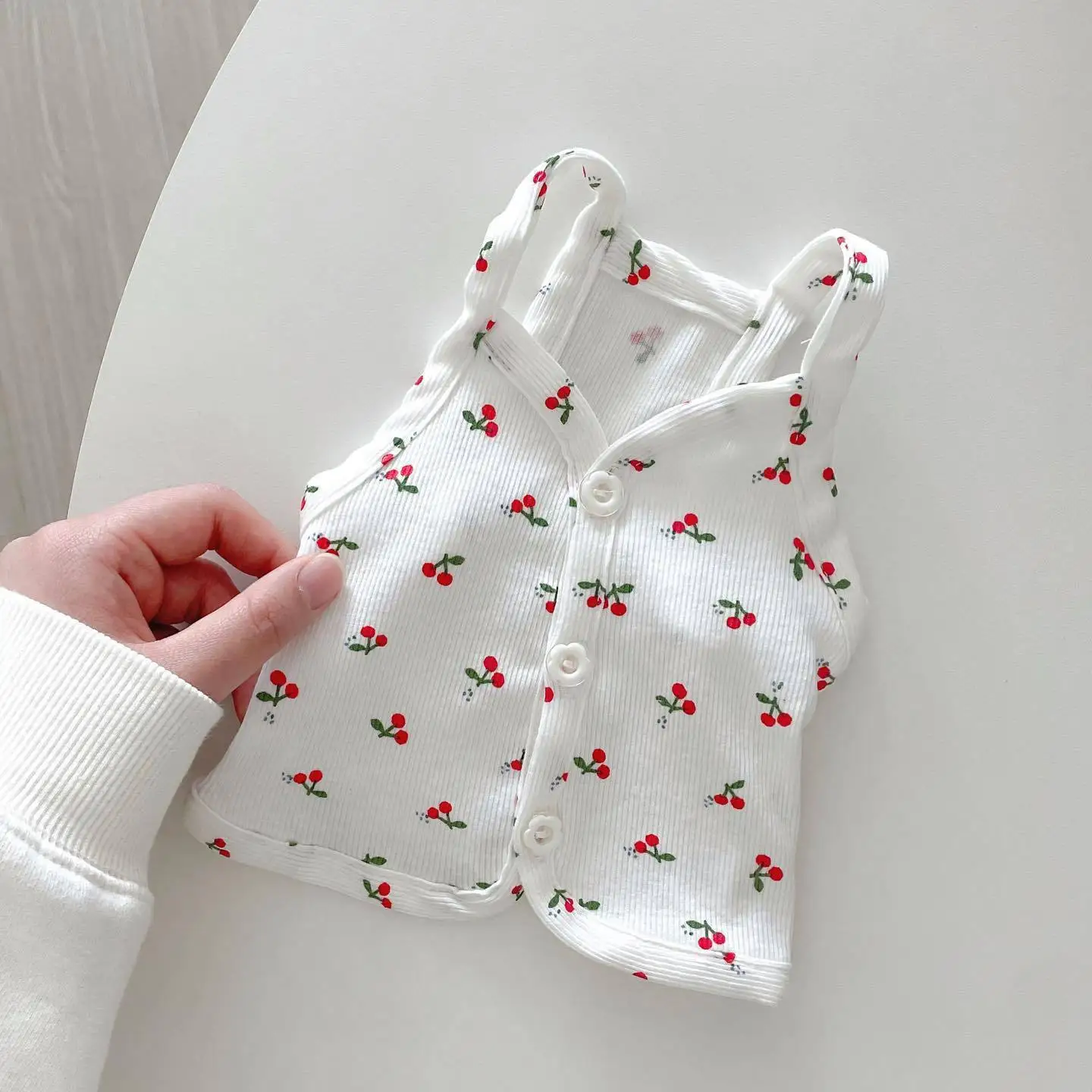 Correa de cereza y osos de peluche