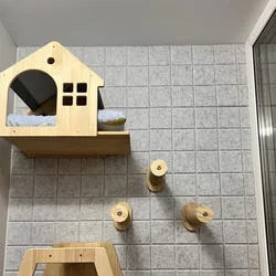 Estructura de escalada mural para gatos con hamaca y poste de sisal