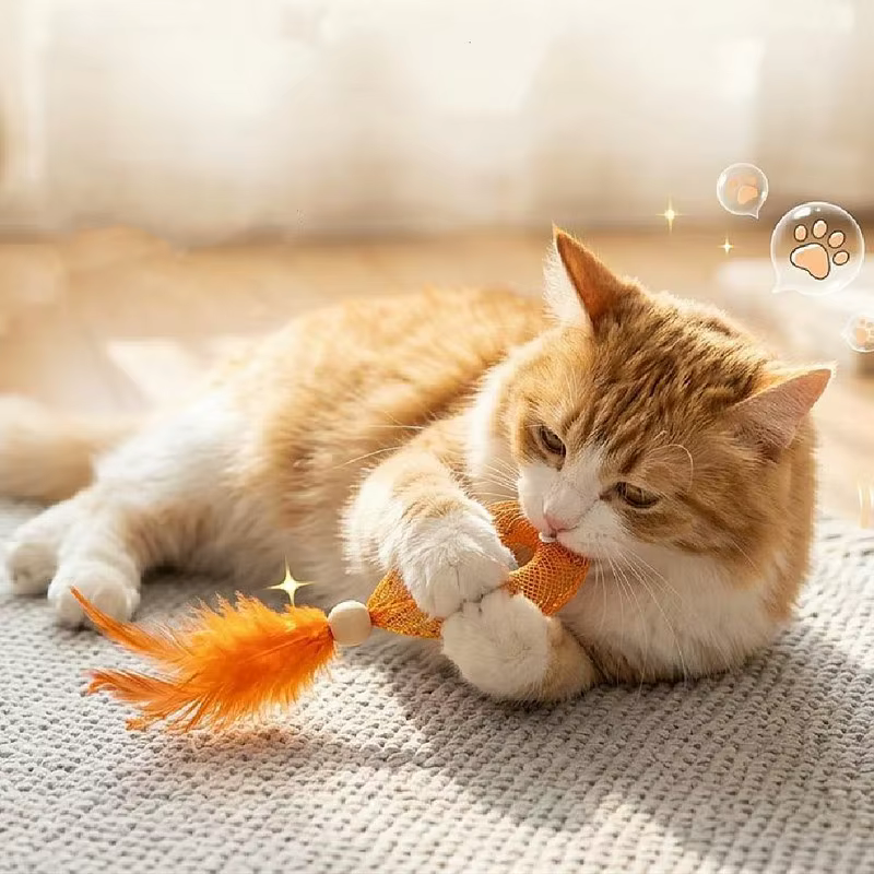 Juguete pez con plumas y campana para gatos – Interactivo y afila garras