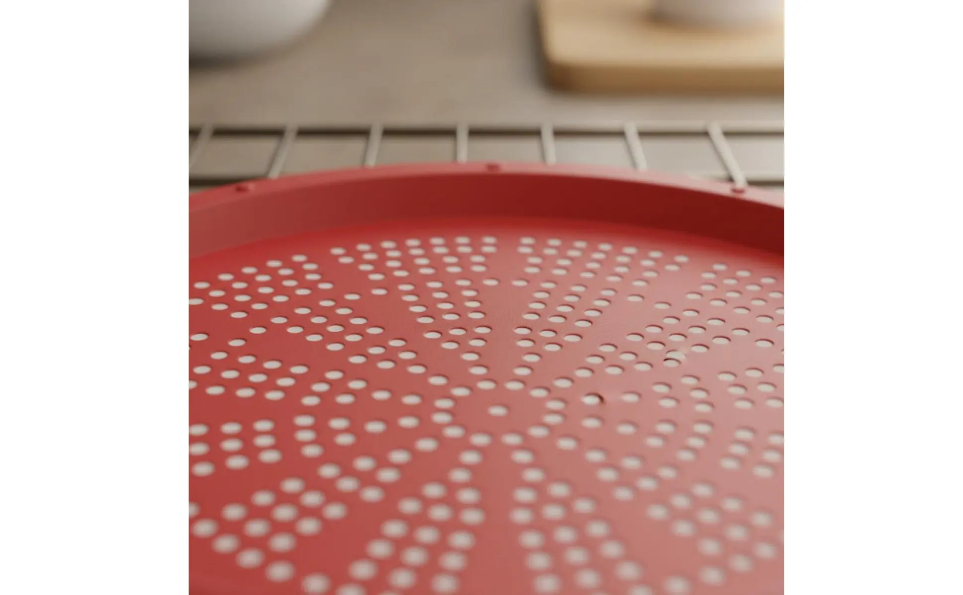 Detalle de la bandeja antiadherente para pizza