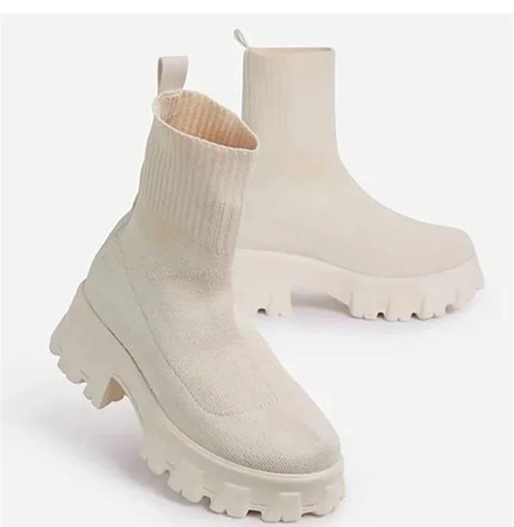Botas blancas de invierno vista lateral