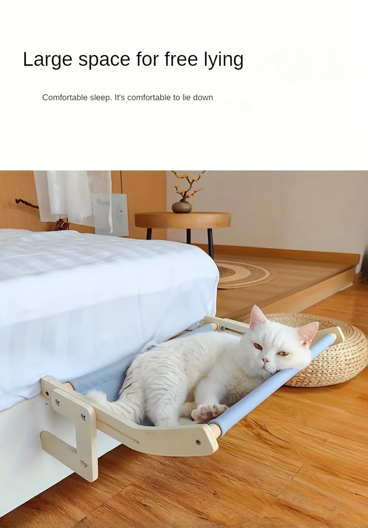 Hamaca instalada en ventana con gato descansando