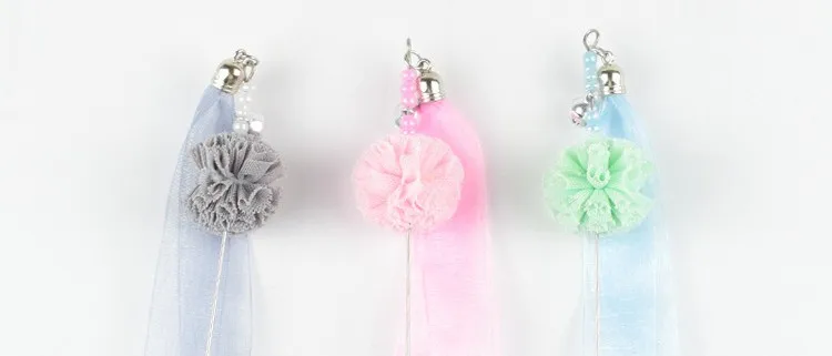 Cinta con borlas multicolores