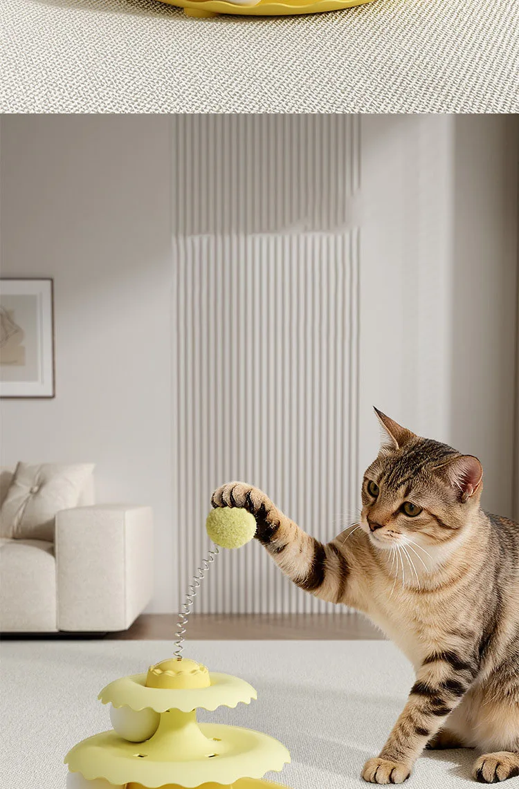 Dos gatos jugando simultáneamente con el juguete en diferentes niveles
